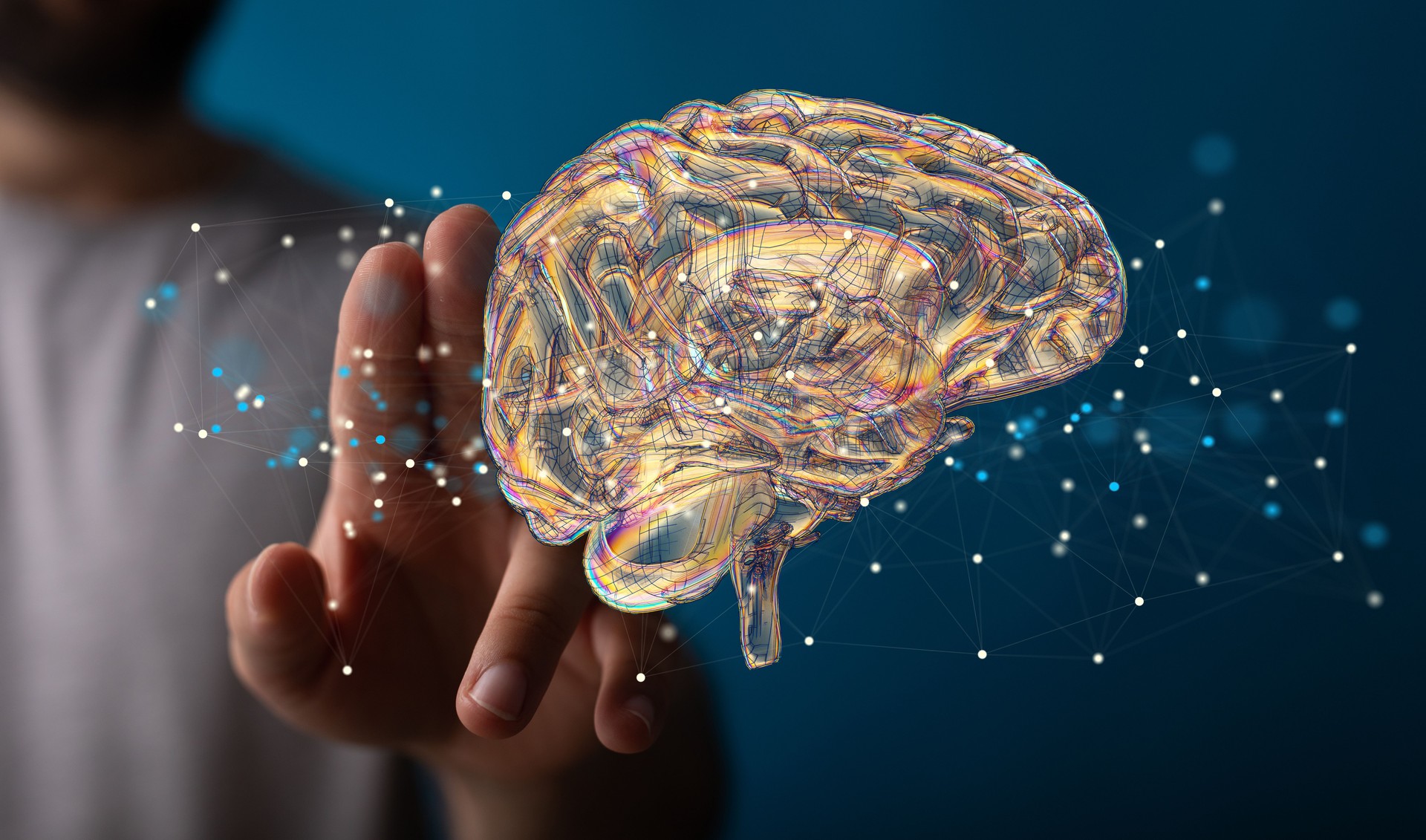 Person presenting the virtual projection of the human brain surrounded by 1s and 0s